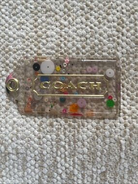 Coach Clear Sequin Confetti Tag with Gold Logo
